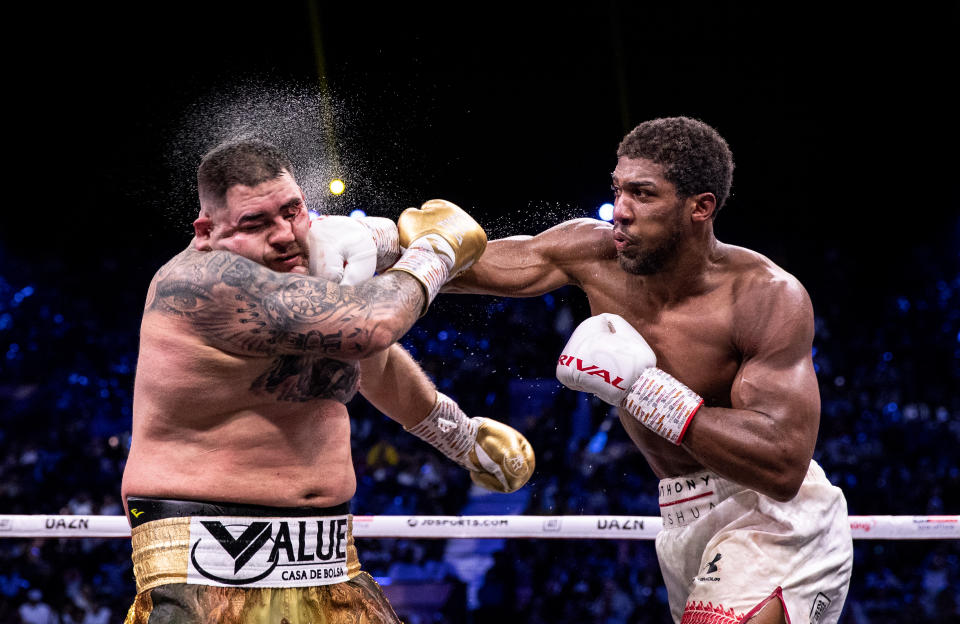 DIRIYAH, SAUDI ARABIA - DECEMBER 07: Anthony Joshua (r) punches Andy Ruiz Jr during the IBF, WBA, WBO & IBO World Heavyweight Title Fight between Andy Ruiz Jr and Anthony Joshua during the Matchroom Boxing 'Clash on the Dunes' show at the Diriyah Season on December 07, 2019 in Diriyah, Saudi Arabia. (Photo by Richard Heathcote/Getty Images)