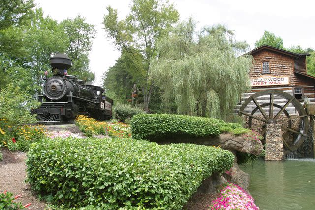 <p>The Dollywood Company</p> Ride the Dollywood Express and grab some cinnamon bread at the Grist Mill on your trip to Dolly's theme park.