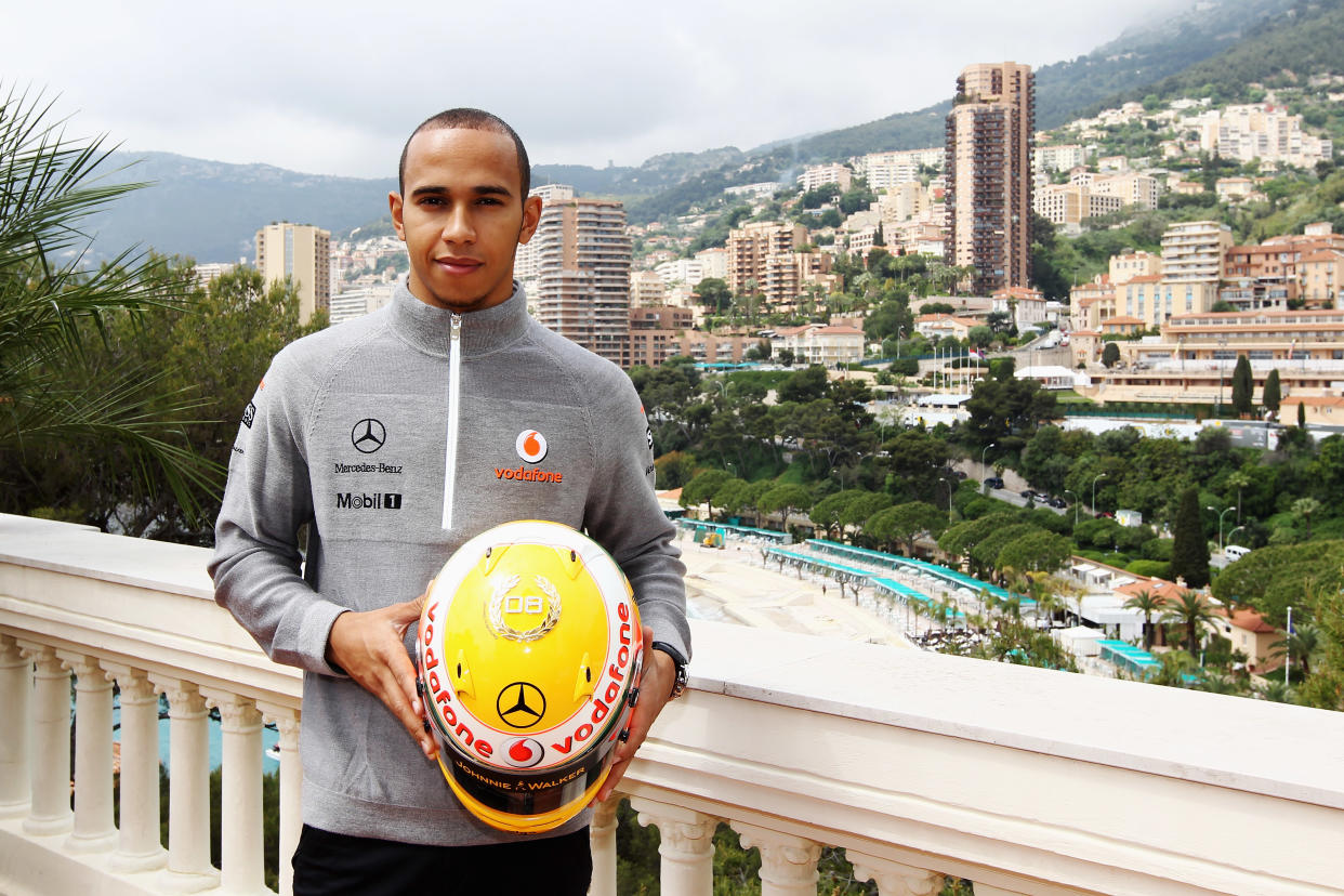 Lewis Hamilton of Great Britain and McLaren Mercedes shows special diamond encrusted helmet to celebrate his 2008 World Championship during previews to the Monaco Formula One Grand Prix on May 12, 2010 in Monte Carlo, Monaco.  (Photo by Paul Gilham/Getty Images)