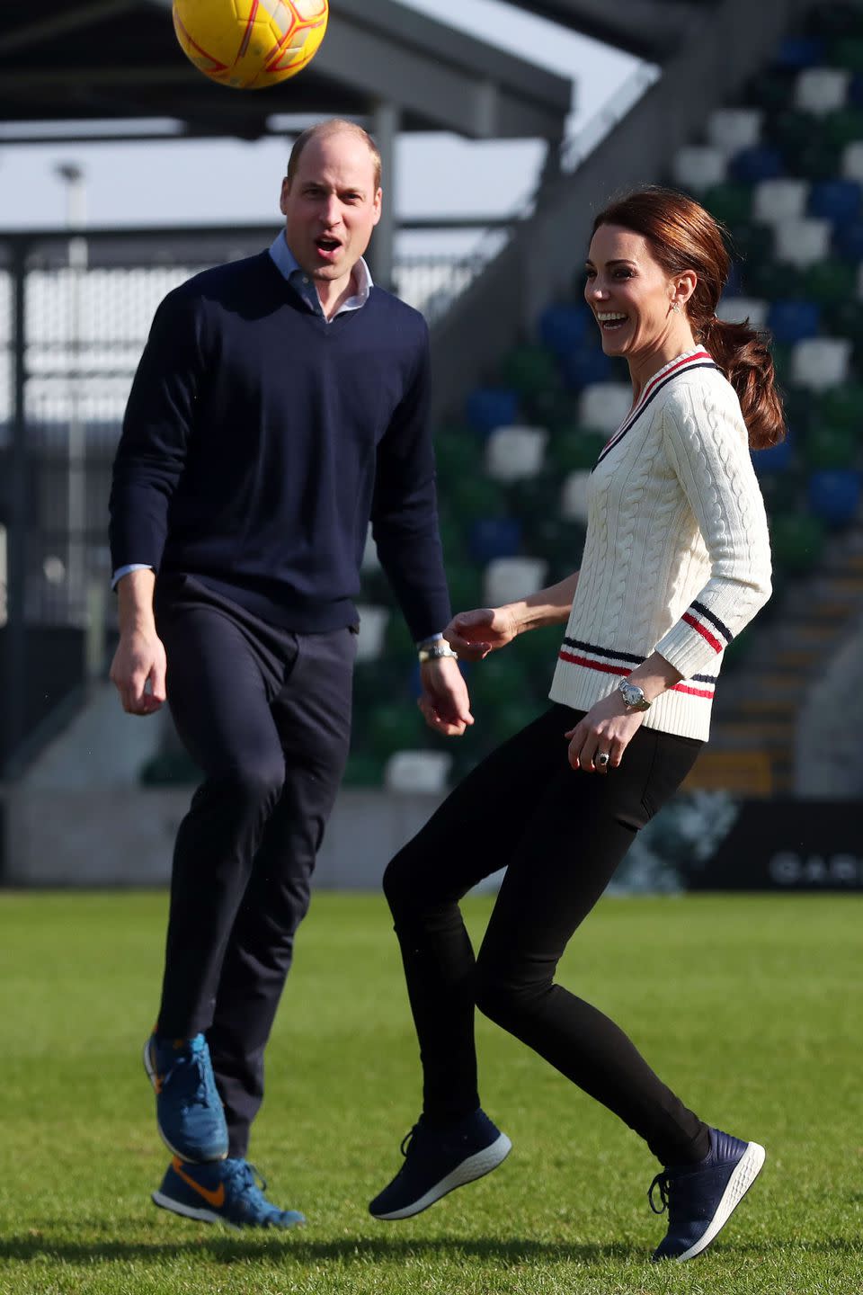 The Duke and Duchess have some fun playing football.