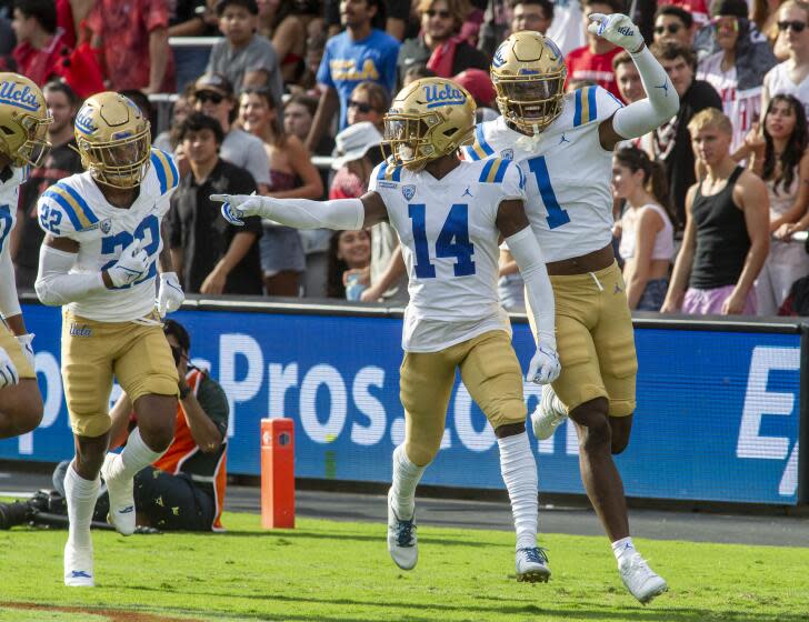 SAN DIEGO, CA - SEPTEMBER 09: UCLA wide receiver Josiah Norwood (14) celebrates his touchdown.