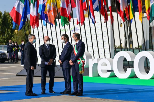 (From L) Italy's Prime Minister, Mario Draghi, Italy's Minister for Ecology Transition, Roberto Cingolani, President of the Lombardy region, Attilio Fontana and Milan mayor Giuseppe Sala arrive to attend the Pre-COP 26 summit at the Milan Conference Centre, MiCO, on September 30, 2021. - Each Conference of the Parties of the UN Framework Convention on Climate Change is preceded by a preparatory meeting held about a month before, called Pre-COP. Italy's Pre-COP brings together through September 30 - October 2 climate and energy ministers from a selected group of countries to discuss topics that will be addressed at COP26. (Photo by MIGUEL MEDINA / AFP) (Photo by MIGUEL MEDINA/AFP via Getty Images) (Photo: MIGUEL MEDINA via AFP via Getty Images)