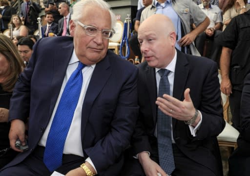 US Ambassador to Israel to David Friedman (L) speaks with White House adviser Jason Greenblatt at an event organised by an Israeli settler-linked group in mainly Palestinian east Jerusalem on June 30, 2019