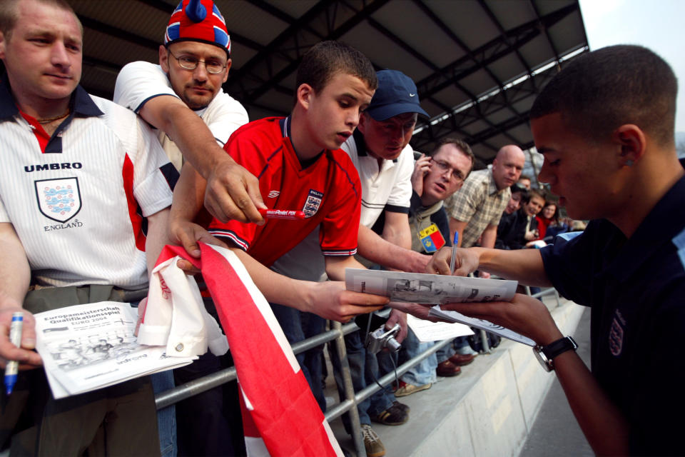 England's Jermaine Jenas signs autographs for fans (Photo by Mike Egerton/EMPICS via Getty Images)