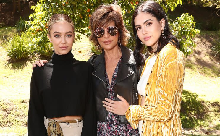 <em>Lisa Rinna flanked by daughters Delilah Belle Hamlin, left, and Amelia Gray Hamlin [Photo: Getty]</em>