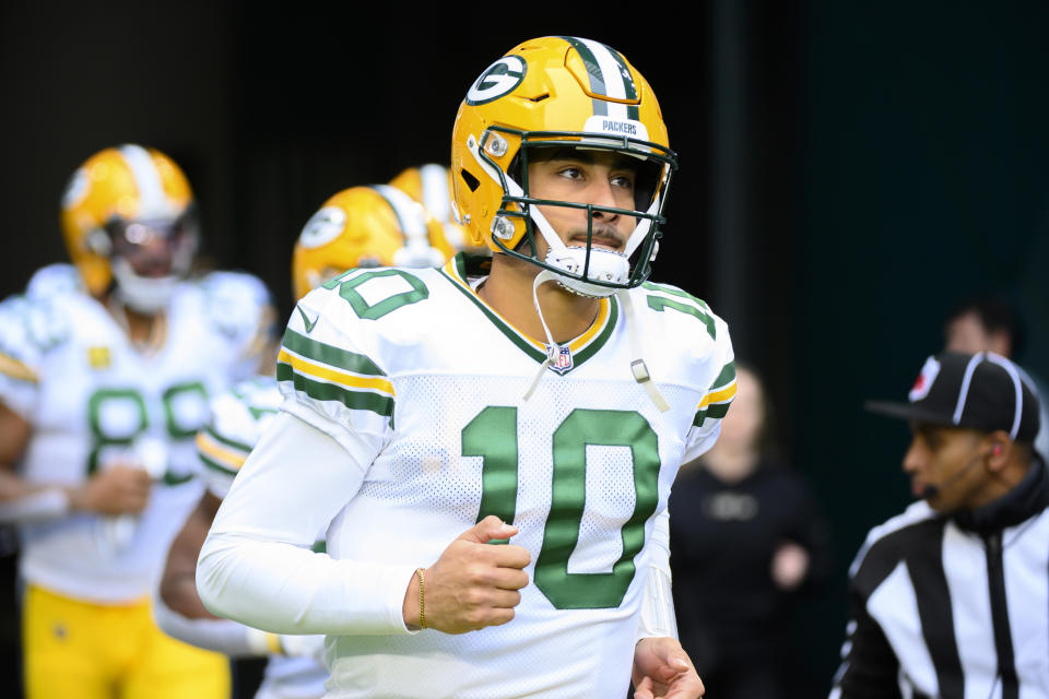 FILE - Green Bay Packers quarterback Jordan Love (10) runs onto the field before an NFL football game against the Miami Dolphins, Sunday, Dec. 25, 2022, in Miami Gardens, Fla. With Aaron Rodgers saying he intends to play for the New York Jets in the upcoming season, Love finally gets his chance to take over as a starting quarterback in his fourth NFL season.(AP Photo/Doug Murray, File)