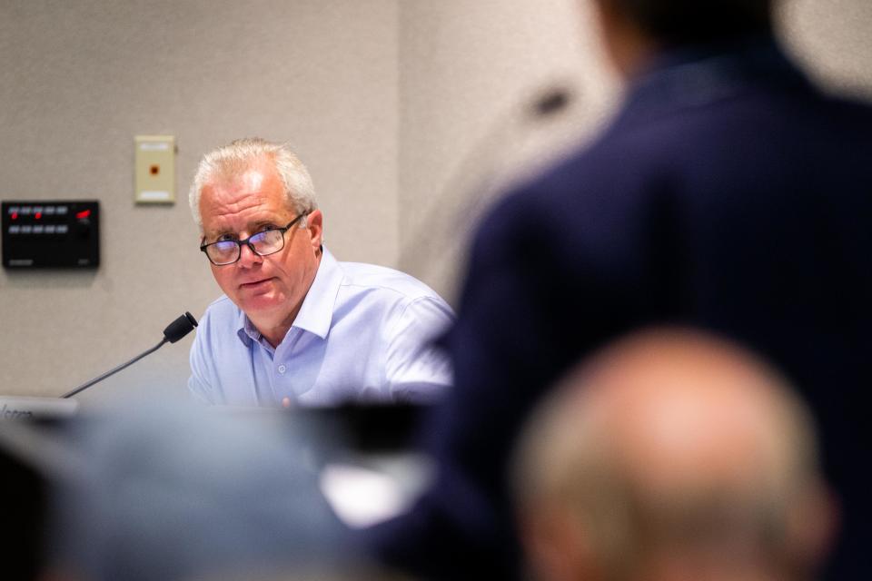 Commissioner Doug Zylstra listens to public comment Tuesday, Sept. 12, 2023, in West Olive.