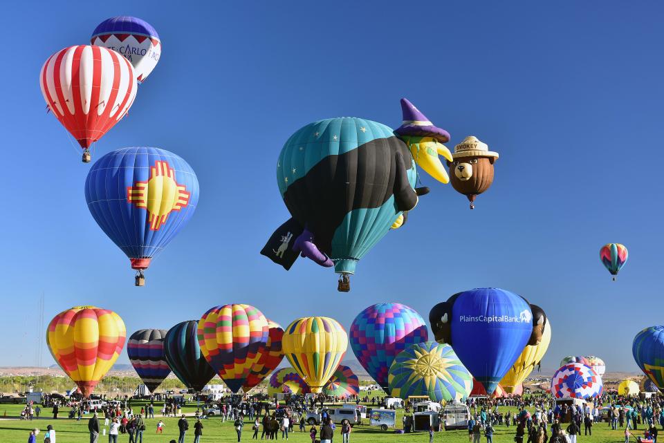 File: During the Mass Ascencion at the opening of the International Balloon Fiesta at Balloon Fiesta Park in Albuquerque, New Mexico in 2014.