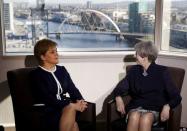 Britain's Prime Minister Theresa May and Scotland's First Minister Nicola Sturgeon meet in a hotel in Glasgow, Scotland, March 27, 2017. REUTERS/Russell Cheyne