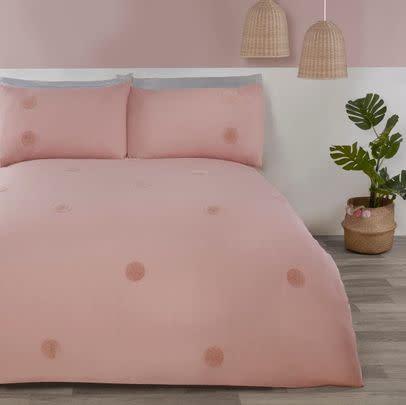 If you love a pop of colour, then this tufted duvet cover set is a total steal