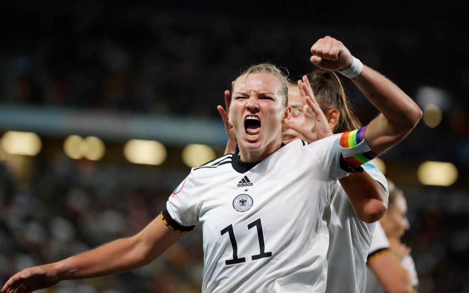 Alexandra Popp celebrates scoring their second goal with teammates - Reuters
