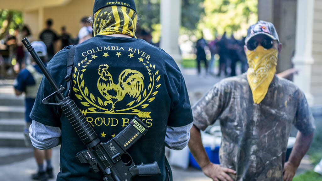 VANCOUVER WASH – SEPTEMBER 5: Armed members of the far-right Proud Boys groups stand guard during a memorial for Patriot Prayer member Aaron Jay Danielson on September 5, 2020 in Vancouver, Washington. Danielson was shot and killed on Saturday, August 29 during a pro-Trump rally in Portland, Oregon. (Photo by Nathan Howard/Getty Images)