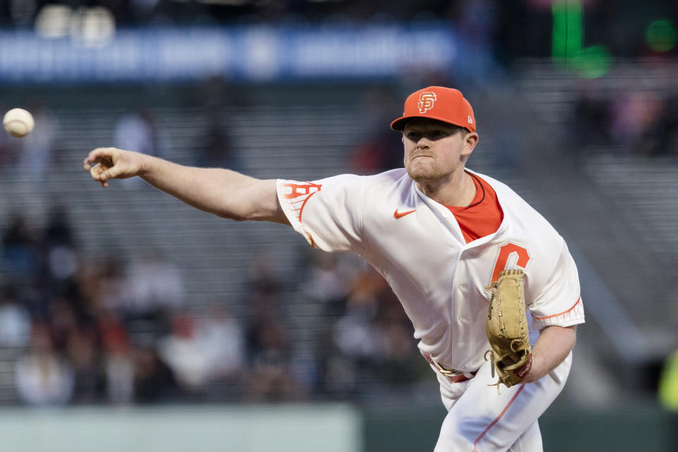 San Francisco Giants' Logan Webb pitches to a Colorado Rockies batter during the first inning of a baseball game in San Francisco, Tuesday, Sept. 27, 2022. (AP Photo/John Hefti)