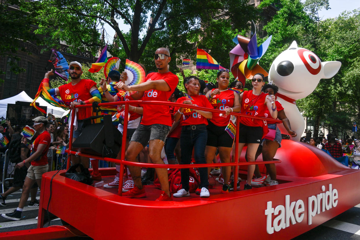 NEW YORK, NEW YORK - JUNE 26: Revelers are seen on the Target float during the 2022 New York City Pride march on June 26, 2022 in New York City. (Photo by Astrida Valigorsky/Getty Images)