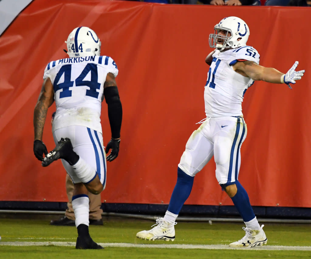 Oct 16, 2017; Nashville, TN, USA; Indianapolis Colts linebacker John Simon (51) celebrates after returning an interception for a touchdown during the second half against the Tennessee Titans at Nissan Stadium. Mandatory Credit: Christopher Hanewinckel-USA TODAY Sports