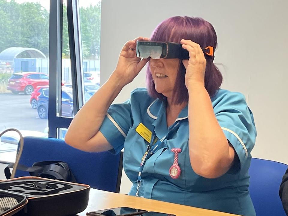 A nurse wearing an NHS hi-tech goggle which is being used on home visits (NHS England/PA) (PA Media)
