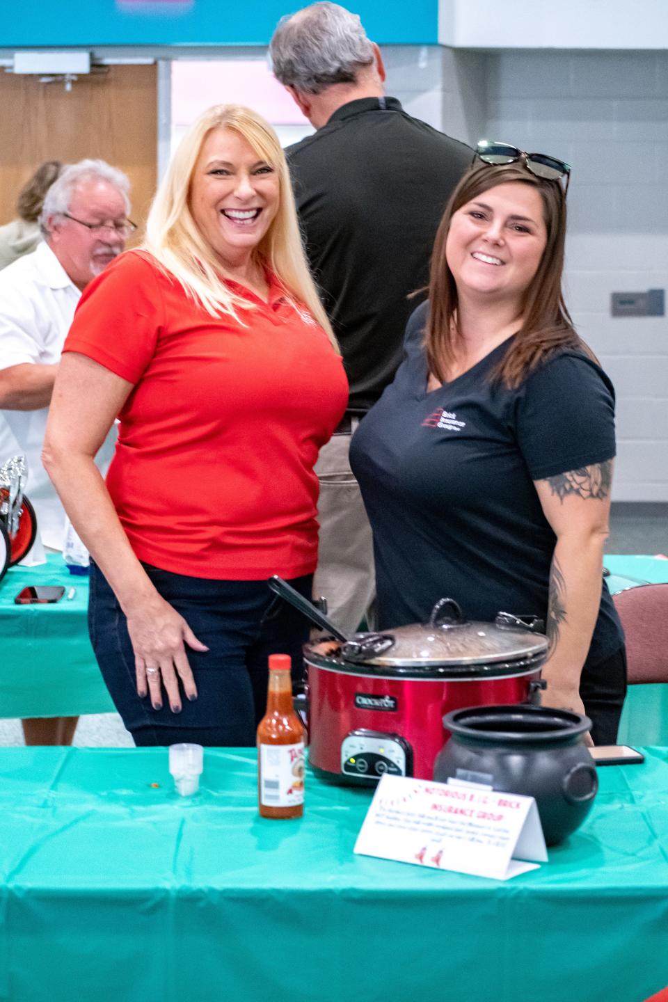 Kearny Hambrick and Rachel Friensehner with the Brick Insurance Group brought their Notorious B.I.G. Chili to the Young Leaders 2022 cook-off.