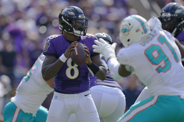 Jackson runs past Vick, effort wasted in brutal Ravens' loss