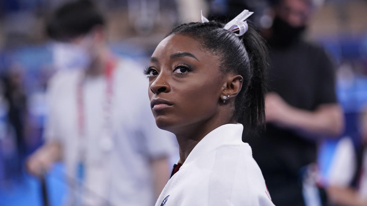 After pulling out of the team gymnastics competition, Simone Biles said she would be working on her mental health the next few days and hoped to still be able to complete in the all-around competition. (AP Photo/Gregory Bull)