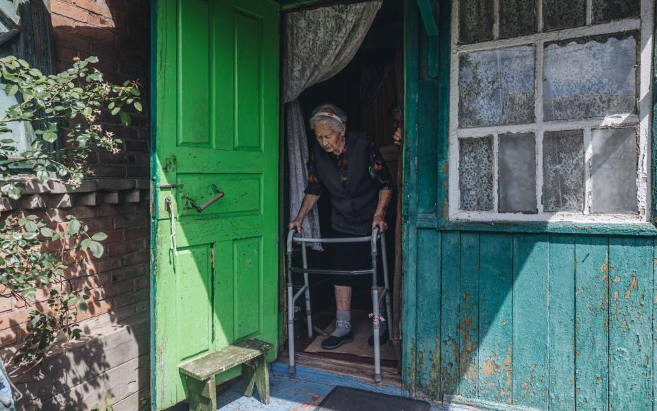 An elderly woman is evacuated from her home in Bakhmut, Ukraine - Diego Herrera Carcedo/Anadolu Agency