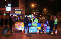 <p>Emergency services work at Manchester Arena after reports of an explosion at the venue during an Ariana Grande gig in Manchester, England Monday, May 22, 2017. Several people have died following reports of an explosion Monday night at an Ariana Grande concert in northern England, police said. A representative said the singer was not injured. (Peter Byrne/PA via AP) </p>