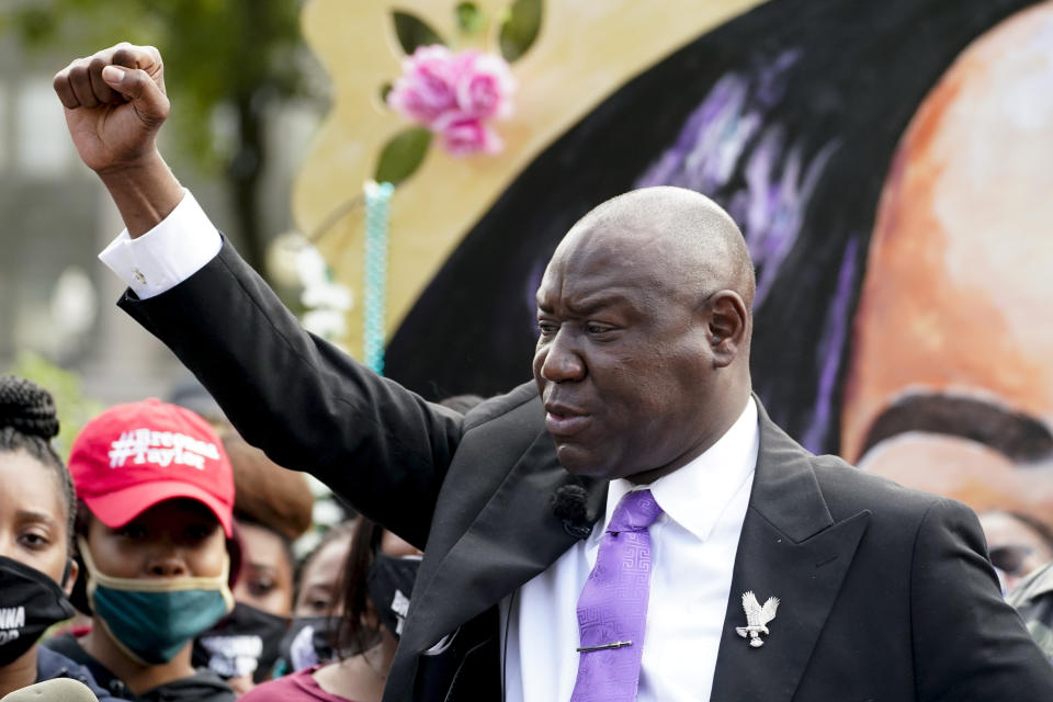 Breonna Taylor family attorney Ben Crump, center speaks during a news conference, Friday, Sept. 25, 2020, in Louisville, Ky. (AP Photo/Darron Cummings)