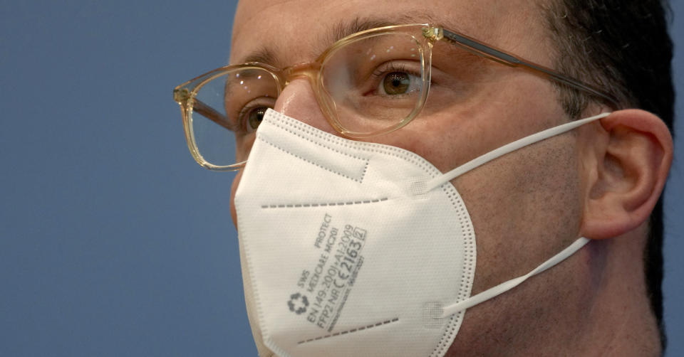 German Health Minister Jens Spahn arrives for a joint press conference with Lothar H. Wieler, president of the Robert-Koch-Institute German national agency and research institute and responsible for disease control and prevention, on the current coronavirus pandemic in Berlin, Germany, Friday, Nov. 12, 2021. (AP Photo/Michael Sohn)