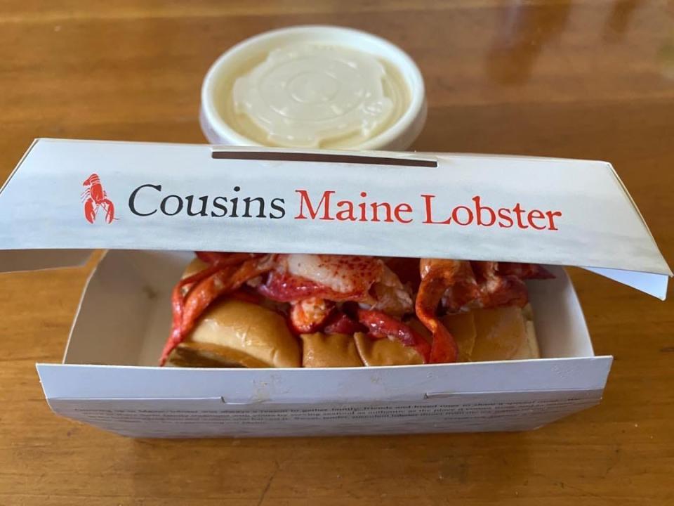 A lobster roll in a box.