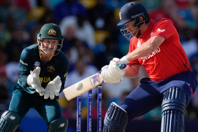 England’s Jonny Bairstow plays a shot watched by Australia wicketkeeper Matthew Wade