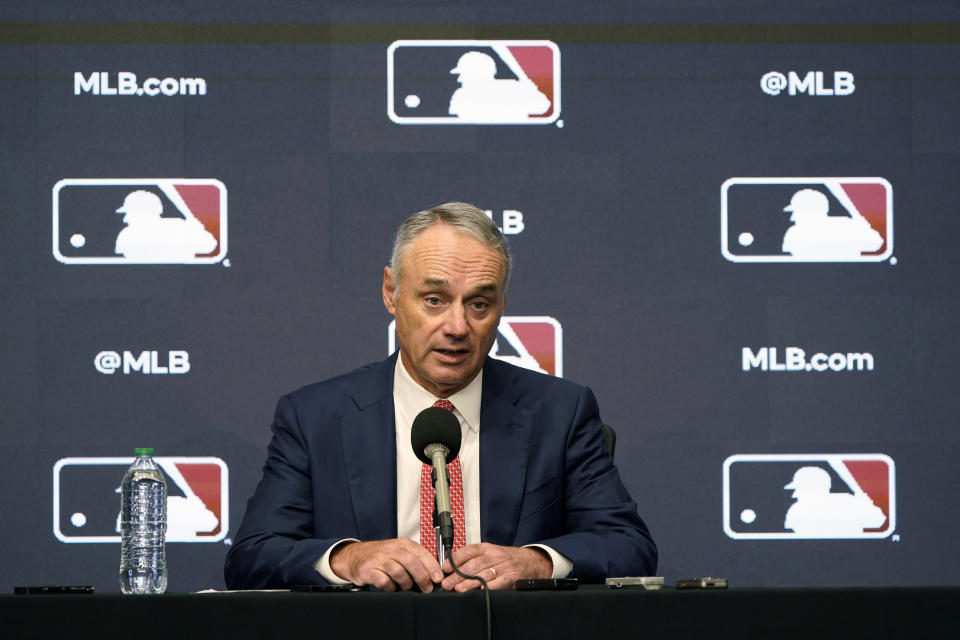 Major League Baseball commissioner Rob Manfred speaks during a news conference in Arlington, Texas, Thursday, Dec. 2, 2021. Owners locked out players at 12:01 a.m. Thursday following the expiration of the sport's five-year collective bargaining agreement. (AP Photo/LM Otero)