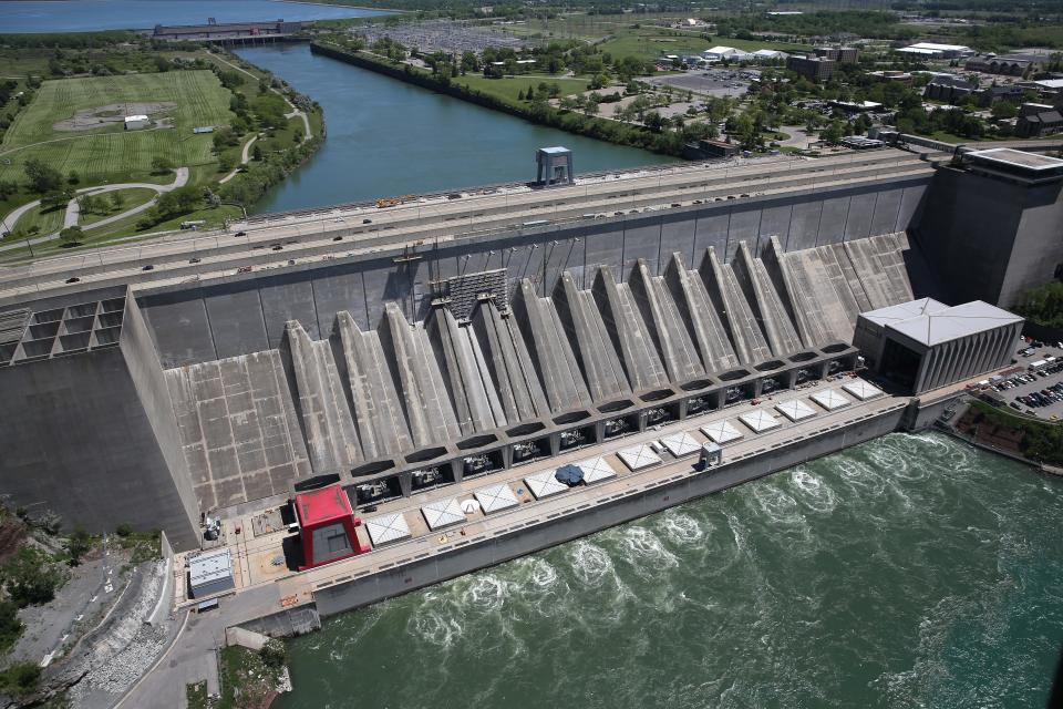 Water from the Niagara River passes through a hydroelectric dam the Robert Moses Generating Facility at Lewiston, New York. When the power plant went online in 1961 it was the biggest hydroelectric producer in the Western world and is still the main source of electricity for the State of New York.