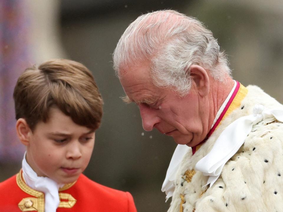Britain's King Charles and Prince George stand during the coronation ceremony at Westminster Abbey, in London, Britain May 6, 2023.