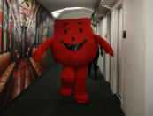 <p>Hey Kool-Aid! The Kool-Aid Man strolls down the hallway with a group of company mascots brought in as interns for the day at Yahoo Studios in New York City on Sept. 25, 2017. (Photo: Gordon Donovan/Yahoo News) </p>