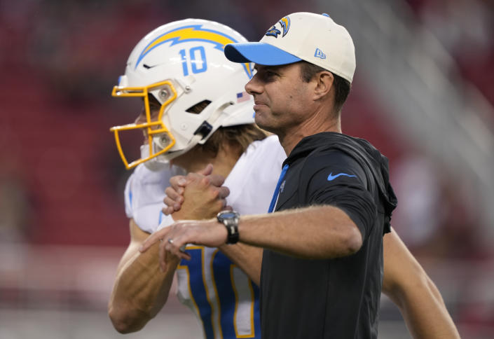 SANTA CLARA, CALIFORNIA - NOVEMBER 13: Head coach Brandon Staley and Justin Herbert #10 of the Los Angeles Chargers are seen on the field prior to the game against the San Francisco 49ers at Levi&#39;s Stadium on November 13, 2022 in Santa Clara, California. (Photo by Thearon W. Henderson/Getty Images)