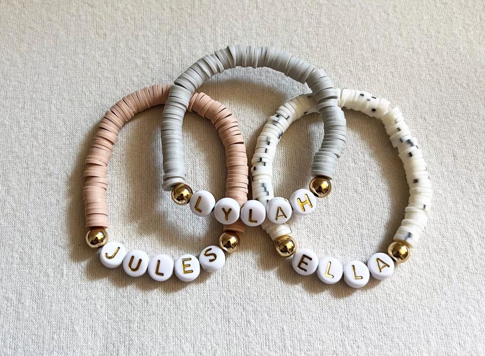 Neutral, custom name bracelets are some of the most popular from KayleeMac Boutique.