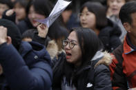 A participant shouts slogans during a weekly rally near the Japanese Embassy in Seoul, South Korea, Wednesday, Jan. 30, 2019. Hundreds of South Koreans are mourning the death of a former sex slave for the Japanese military during World War II by demanding reparations from Tokyo over wartime atrocities. (AP Photo/Lee Jin-man)