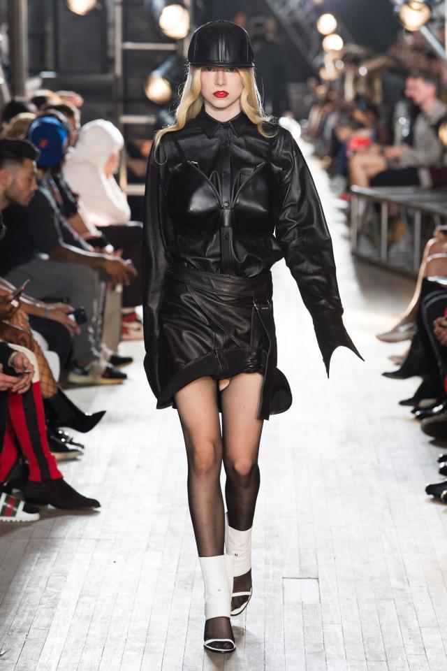 Hunter Schafer walks on the runway during the Coach New York