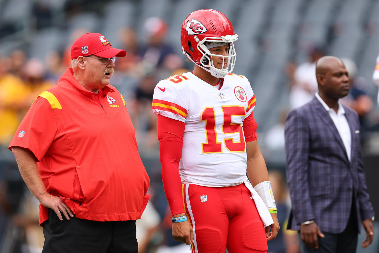 CHICAGO, ILLINOIS - AUGUST 13: Head coach Andy Reid and Patrick Mahomes #15 of the Kansas City Chiefs talk prior to a preseason game against the Chicago Bears at Soldier Field on August 13, 2022 in Chicago, Illinois. (Photo by Michael Reaves/Getty Images)