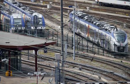 A new Regiolis regional train (R) made by power and train-making firm Alstom, is seen next to a platform at Strasbourg's railway station, May, 21, 2014. REUTERS/Vincent Kessler