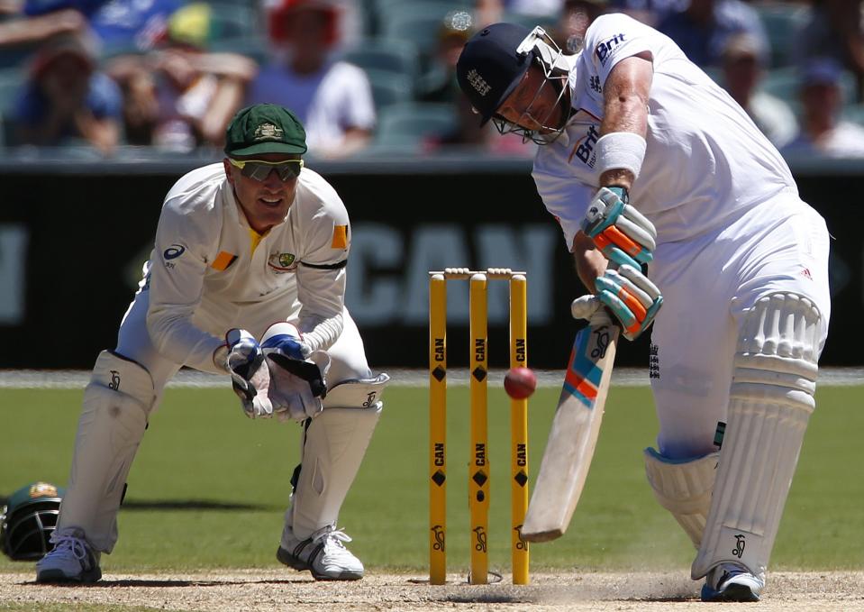 England's Ian Bell (R) plays a shot next to Australia's Brad Haddin during the third day of the second Ashes test cricket match at the Adelaide Oval December 7, 2013.