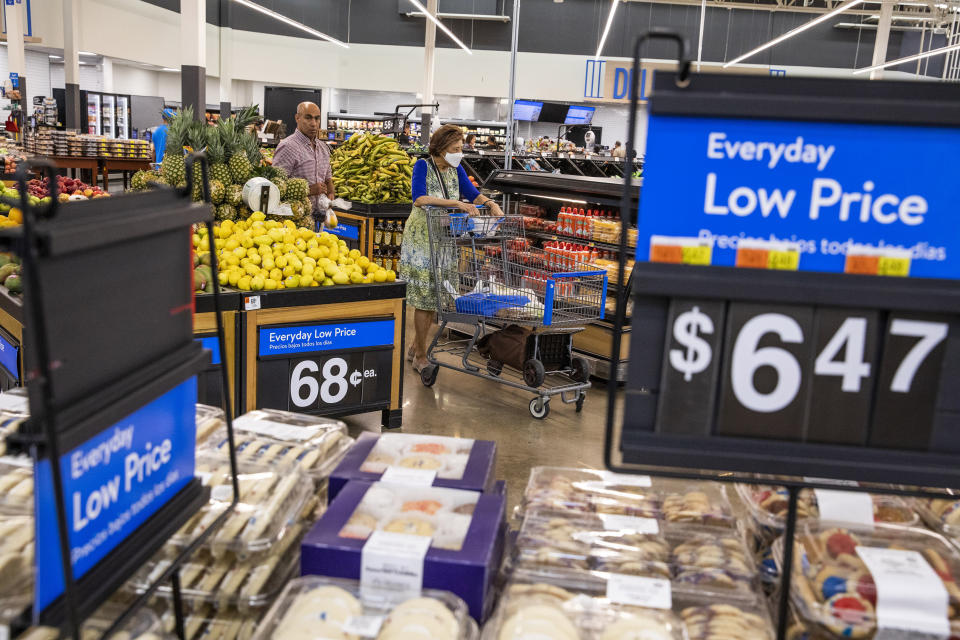 FILE - People buy groceries at a Walmart Superstore in Secaucus, New Jersey, July 11, 2024. (AP Photo/Eduardo Munoz Alvarez)