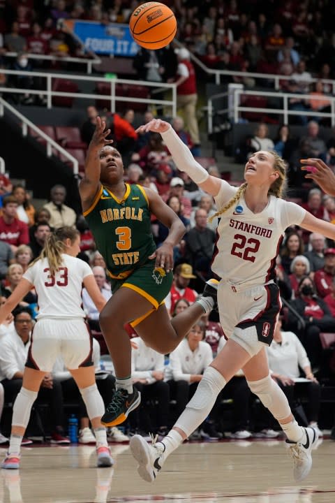 Norfolk State guard Diamond Johnson, left, shoots while defended by Stanford forward Cameron Brink during the first half of a first-round college basketball game in the women’s NCAA Tournament in Stanford, Calif., Friday, March 22, 2024. (AP Photo/Godofredo A. Vásquez)