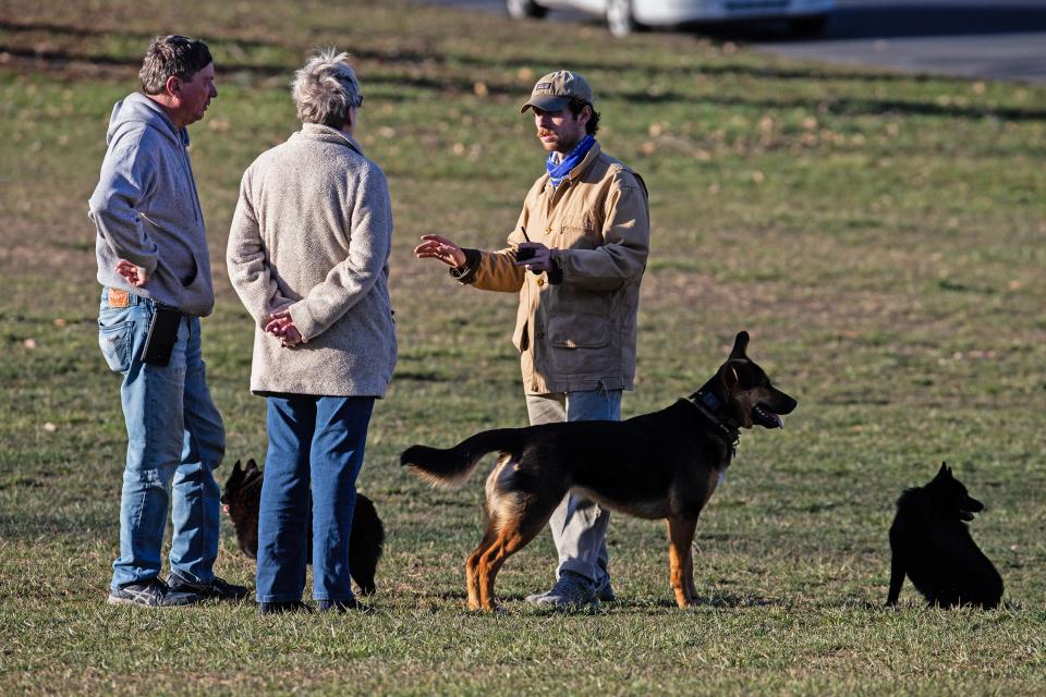 Visitors and their dogs enjoy a sunny afternoon at the Rockford Dog Park in Wilmington, Wednesday, March 23, 2023.