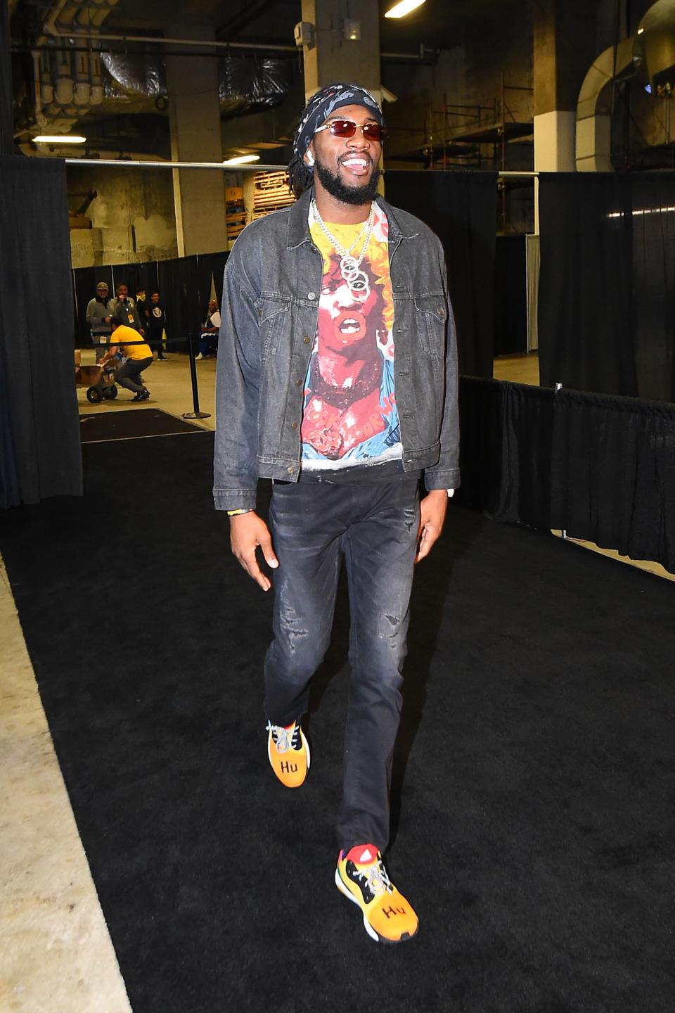 Kenneth Faried of the Houston Rockets arrives in a pair of Adidas Solar Hu sneakers.