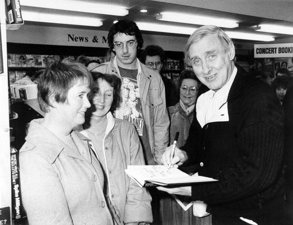 Comic Spike Milligan visited Austicks Bookshop on The Headrow in October 1985 where he  signed copies of his latest book Where Have All the Bullets Gone? Patricia Gatehouse, left, is pictured with the former Goon during the two hour signing session.