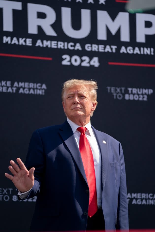 Former President Donald Trump waves to the crowd during a campaign rally on Sept. 25, 2023, in Summerville, South Carolina. The former president has a strong lead in the polls over his Republican challengers and does not plan to participate in Wednesday's Republican presidential debate. 