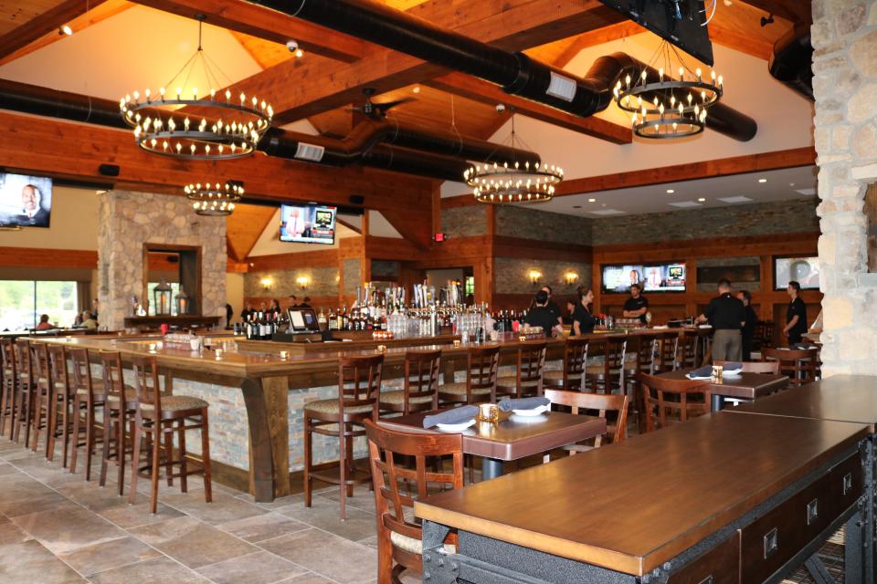 The expansive bar at Stone Water, a lakeside American restaurant in Sussex County