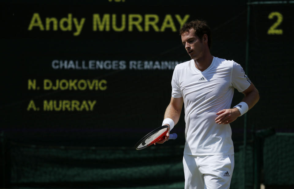 Great Britain's Andy Murray reacts in his Men's Final against Serbia's Novak Djokovic during day thirteen of the Wimbledon Championships at The All England Lawn Tennis and Croquet Club, Wimbledon.