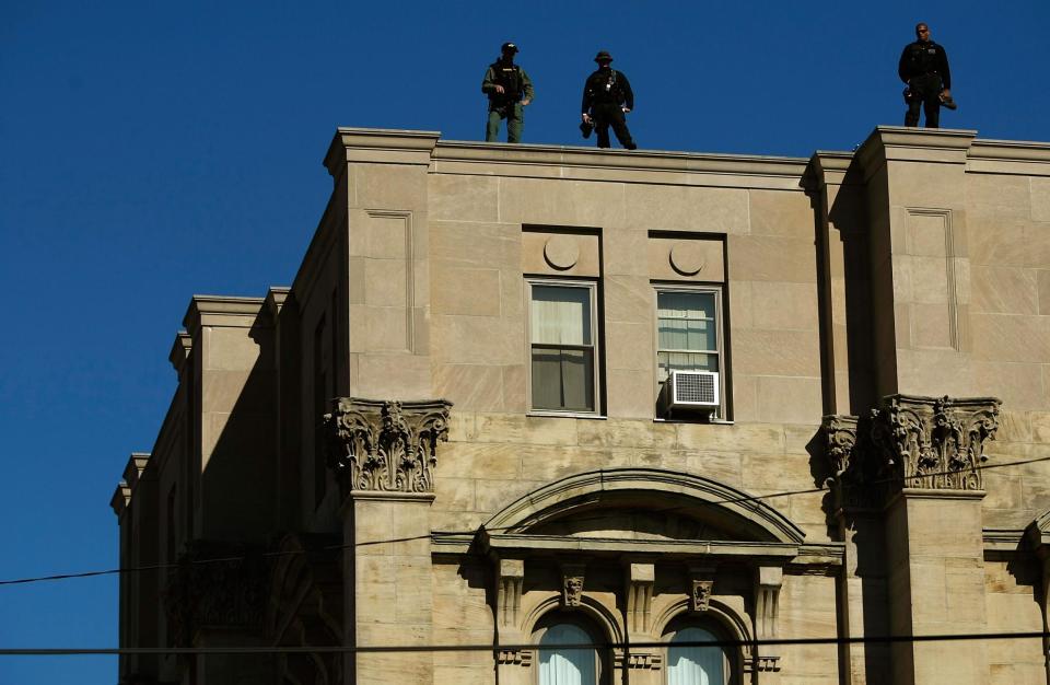 Police officers stand on top of the Jefferson County courthouse in Steubenville, Ohio in this photo from 2008: Getty/Chip Somodevilla