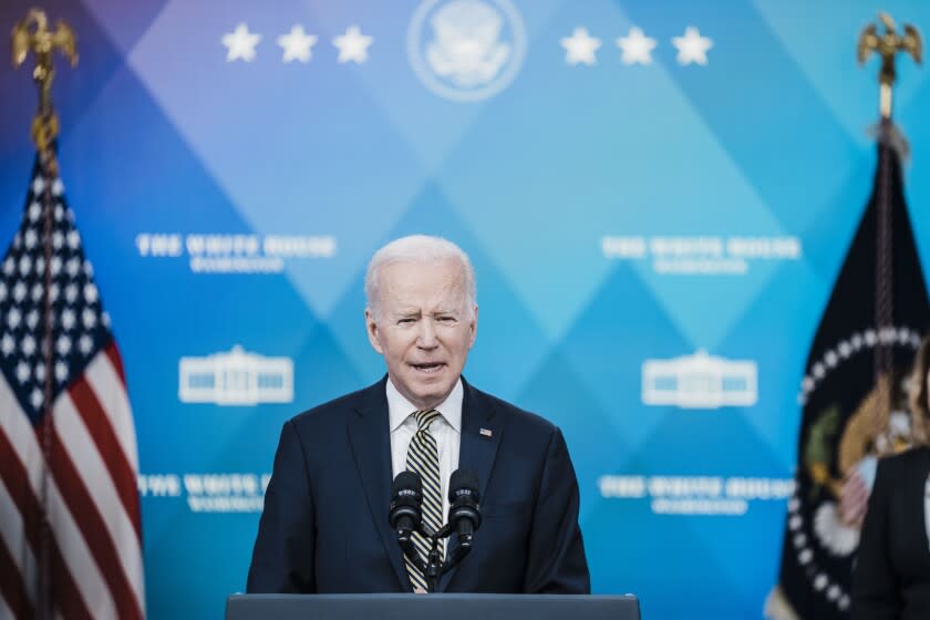 WASHINGTON, DC - MARCH 16: President Joe Biden, center, delivers remarks on Ukraine, flanked by Secretary of State Antony Blinken, Deputy Secretary of Defense Kathleen Hicks and Chairman of the Joint Chiefs of Staff Gen. Mark Milley, during an event in the South Court Auditorium at Eisenhower Executive Office Building on the White House Campus on Wednesday, March 16, 2022 in Washington, DC. (Kent Nishimura / Los Angeles Times)